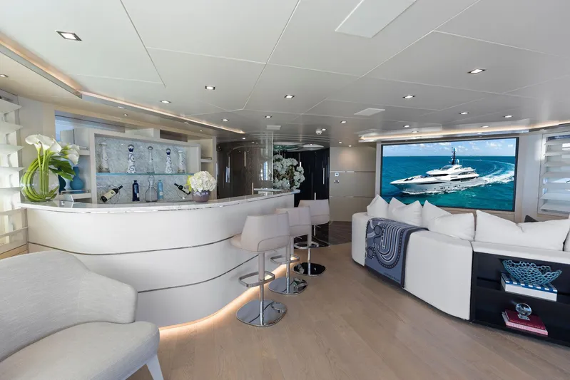Moonraker Yacht Photos Pics Luxurious interior of 2019 Bilgin 156 yacht with modern bar and seating area.