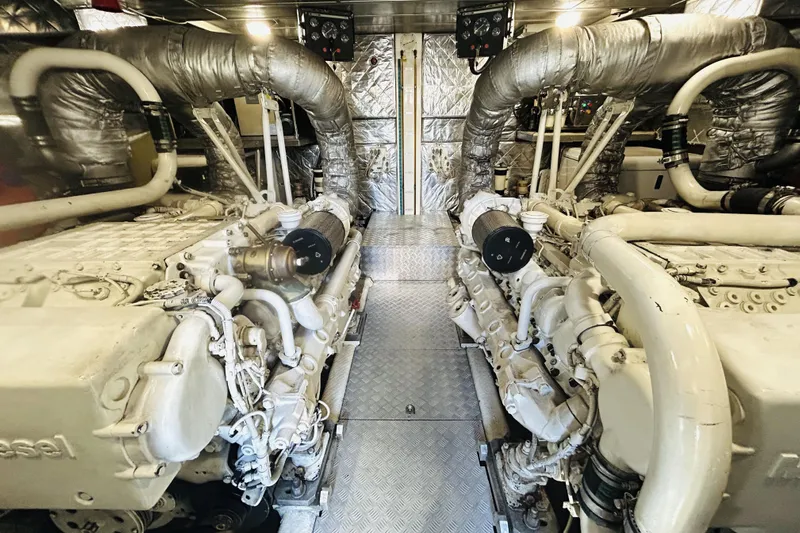  Yacht Photos Pics Engine room of a 2004 Canados 72s yacht, featuring dual diesel engines.