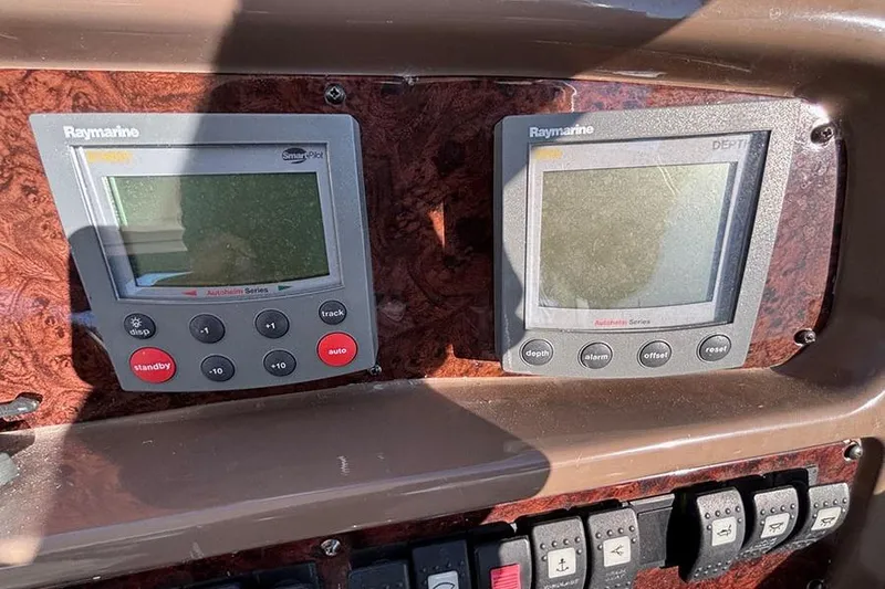  Yacht Photos Pics Control panel of a 2005 Regal Commodore 4260 with Raymarine displays.
