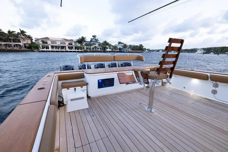 Next To Sell Yacht Photos Pics 2020 HCB Estrella boat deck with fishing chair and waterfront view.