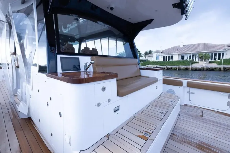 Next To Sell Yacht Photos Pics 2020 HCB Estrella boat with teak deck and cushioned seating area.