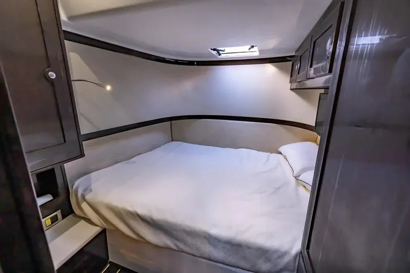 Next To Sell Yacht Photos Pics Cozy bedroom cabin in a 2020 HCB Estrella boat with modern furnishings.