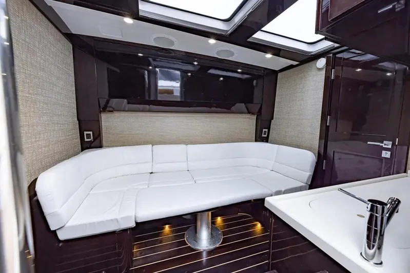 Next To Sell Yacht Photos Pics Luxurious interior of 2020 HCB Estrella yacht with white leather seating and modern design.