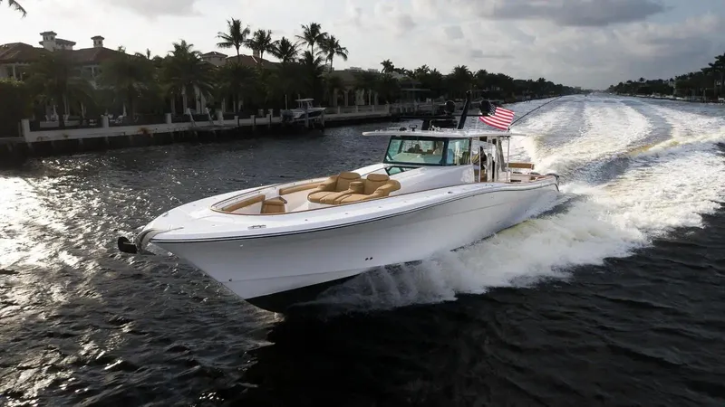 Next To Sell Yacht Photos Pics 2020 HCB Estrella luxury yacht cruising on a waterway with palm trees in the background.