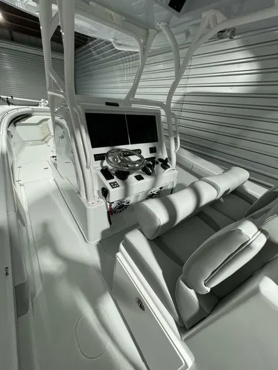 36 Yellowfin Yacht Photos Pics 2024 Yellowfin 36 boat interior with modern helm and seating in storage.