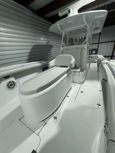 36 Yellowfin Yacht Photos Pics 2024 Yellowfin 36 boat interior with seating and console, stored indoors.