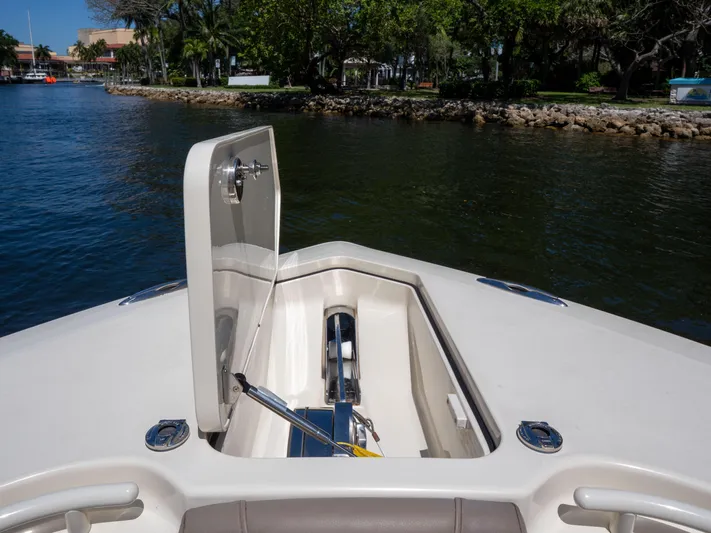  Yacht Photos Pics 2015 Scout 320 LFX boat with open anchor hatch on calm water.