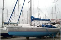 Sailboat "Lucky II" on land, Custom Patago 40, 2019, with blue hull and sails.