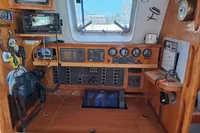 Navigation station of 2019 Custom Patago 40 yacht with control panels and equipment.
