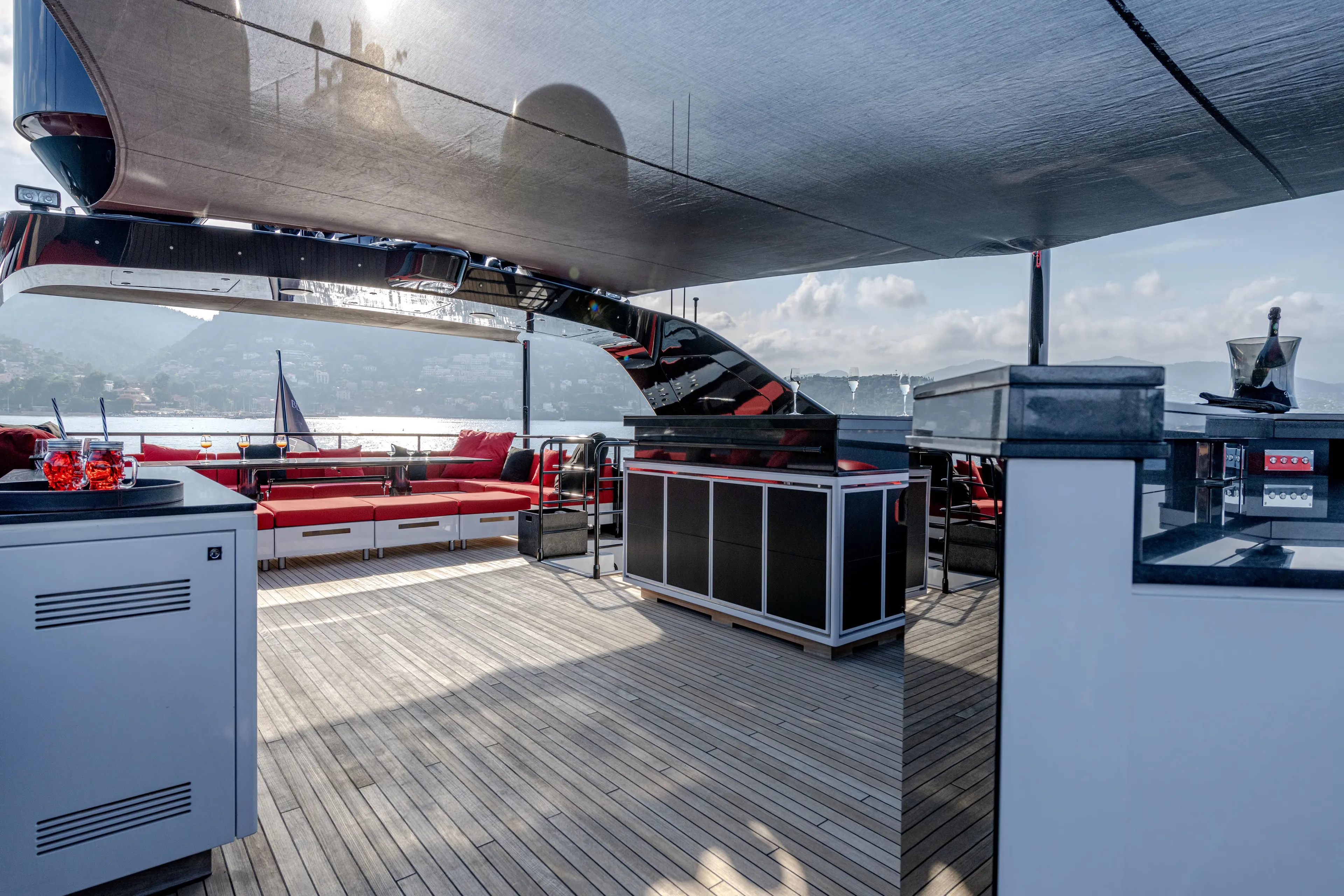 Black Legend Yacht Photos Pics Luxurious 2017 Mangusta 165E yacht deck with modern seating and panoramic views.