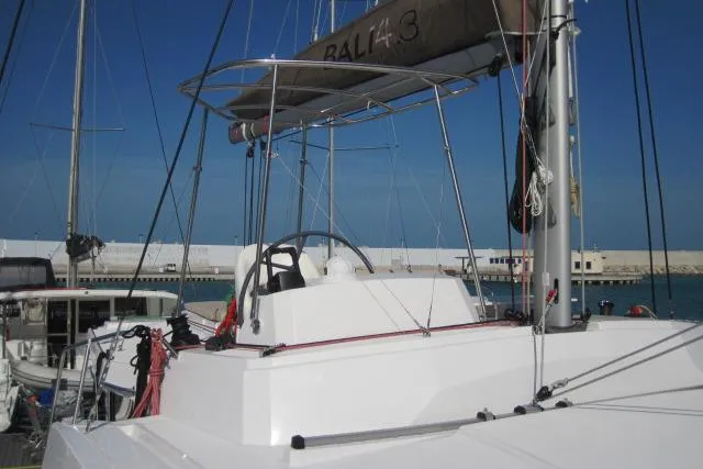  Yacht Photos Pics Bali 4.3 catamaran, 2020 model, docked at a marina under clear blue skies.