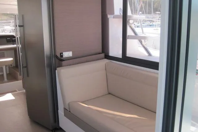  Yacht Photos Pics Cozy seating area inside a 2020 Bali 4.3 yacht with modern interior design.
