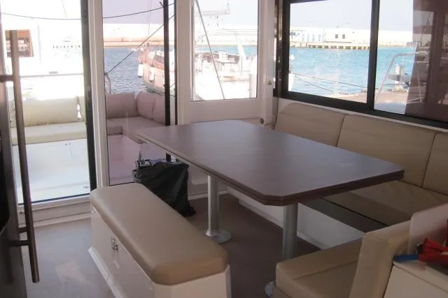  Yacht Photos Pics Interior of 2020 Bali 4.3 catamaran with dining area and ocean view.