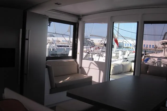  Yacht Photos Pics Interior of 2020 Bali 4.3 catamaran with marina view through large windows.