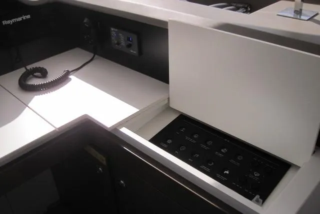  Yacht Photos Pics Control panel on a 2020 Bali 4.3 yacht, featuring modern navigation equipment.