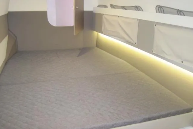 Yacht Photos Pics Interior cabin of 2020 Bali 4.3 with a spacious bed and soft lighting.
