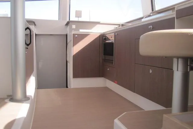  Yacht Photos Pics Interior of 2020 Bali 4.3 catamaran, featuring modern kitchen cabinetry and seating.