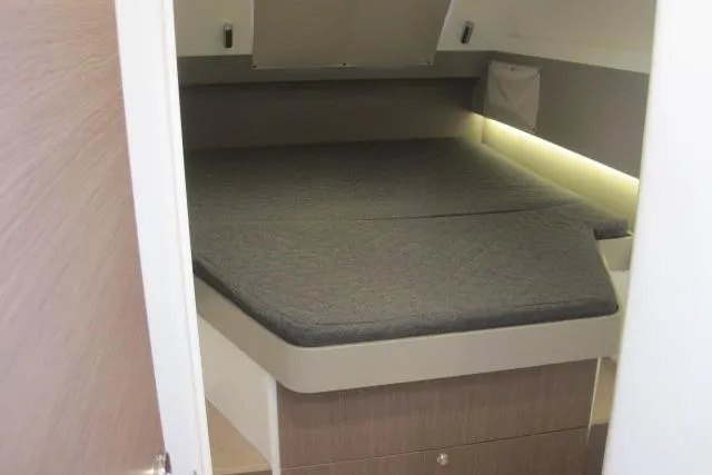  Yacht Photos Pics Interior cabin of a 2020 Bali 4.3 yacht with a cozy bed.