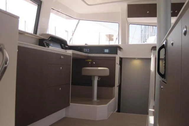  Yacht Photos Pics Interior of 2020 Bali 4.3 catamaran with modern cabinetry and seating.