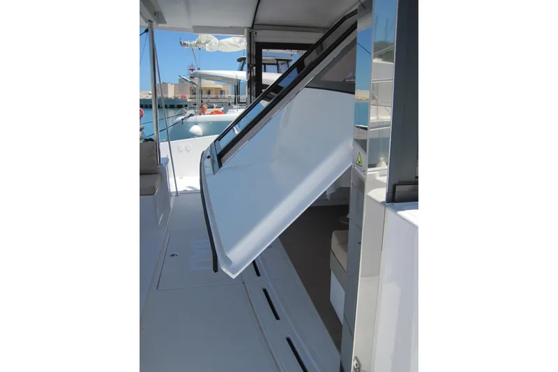  Yacht Photos Pics 2020 Bali 4.3 yacht with open deck hatch, docked in marina.