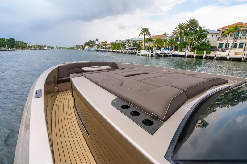 Cobra Yacht Photos Pics 2022 Vanquish Yachts VQ45 luxury yacht on a scenic waterway.