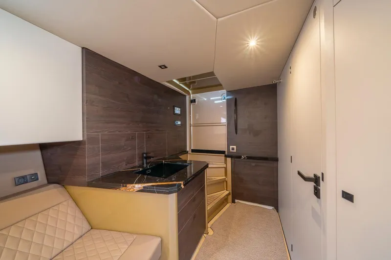 Cobra Yacht Photos Pics Luxurious interior of 2022 Vanquish Yachts VQ45 with modern design and elegant finishes.