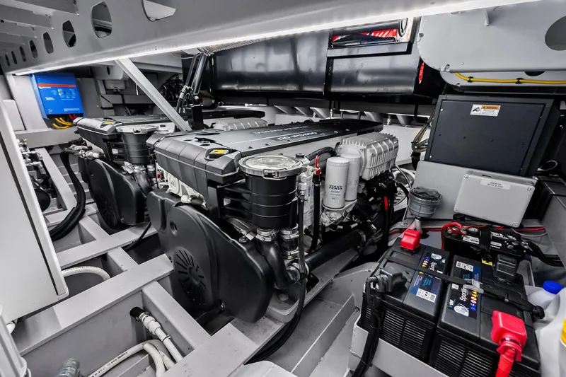 Cobra Yacht Photos Pics Engine room of 2022 Vanquish Yachts VQ45, showcasing dual engines and battery system.