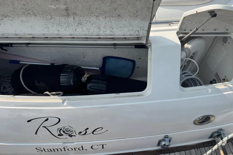 Rose Yacht Photos Pics 2001 Sea Ray 540 Sundancer boat storage compartment with equipment, docked in Stamford, CT.