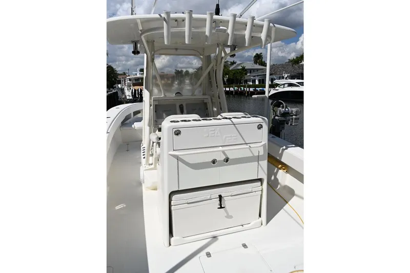  Yacht Photos Pics 2016 SeaVee 340Z boat interior with helm station and storage compartments.