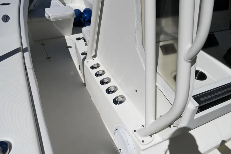  Yacht Photos Pics 2016 SeaVee 340Z boat interior with rod holders and seating area.