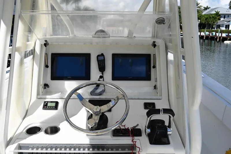  Yacht Photos Pics 2016 SeaVee 340Z boat dashboard with dual screens, steering wheel, and controls.