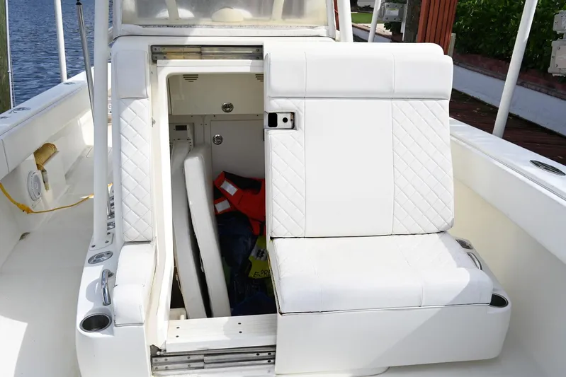  Yacht Photos Pics 2016 SeaVee 340Z boat interior with white seating and storage compartment.