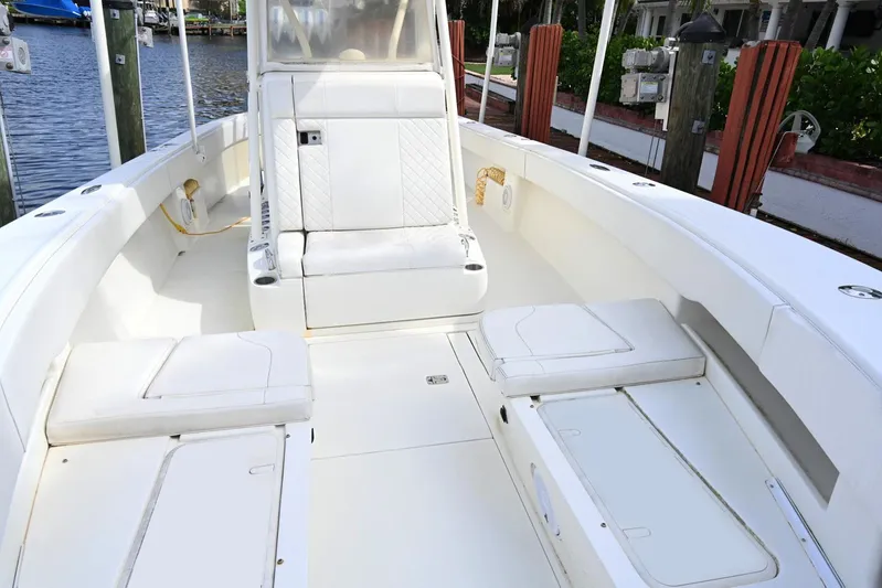  Yacht Photos Pics 2016 SeaVee 340Z boat interior with white seating and storage compartments.