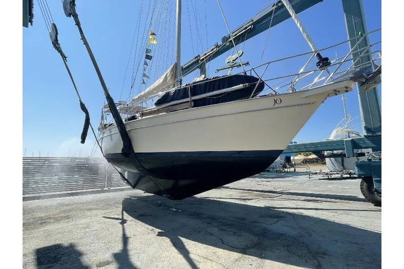  Yacht Photos Pics Island Packet 380 sailboat from 1999 in dry dock, viewed from the bow.