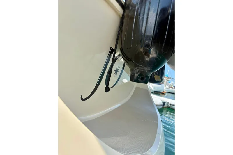  Yacht Photos Pics 1999 Island Packet 380 boat detail with docked vessels in background.