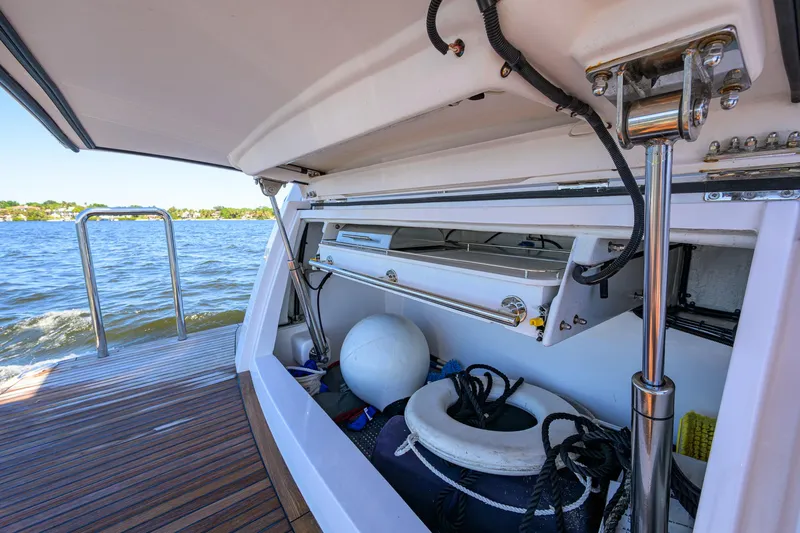Fluke Yacht Photos Pics Kadey-Krogen 54 Summit Motoryacht 2020 storage area with marine equipment by the water.
