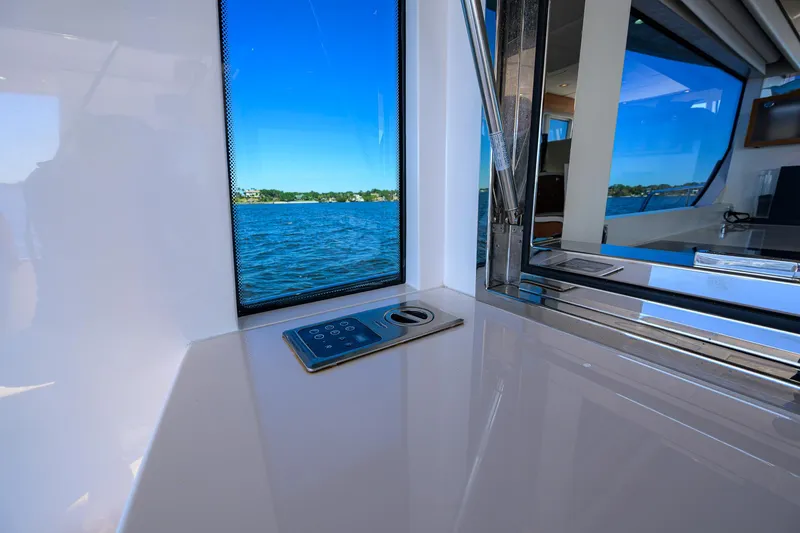 Fluke Yacht Photos Pics Kadey-Krogen 54 Summit Motoryacht 2020 interior with ocean view through window.