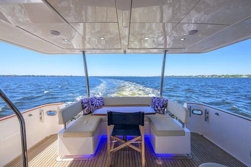 Fluke Yacht Photos Pics Kadey-Krogen 54 Summit Motoryacht 2020, rear deck view, cruising on open water.