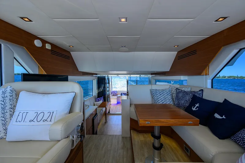 Fluke Yacht Photos Pics Interior of 2020 Kadey-Krogen 54 Summit Motoryacht with elegant seating and ocean view.