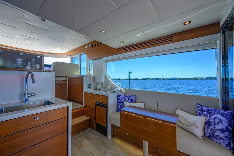 Fluke Yacht Photos Pics Luxurious interior of 2020 Kadey-Krogen 54 Summit Motoryacht with scenic ocean view.