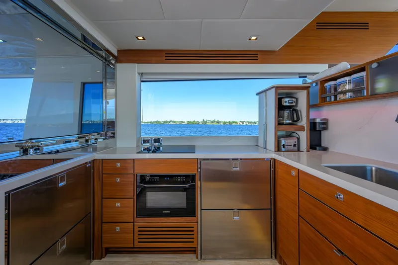 Fluke Yacht Photos Pics Modern kitchen interior of 2020 Kadey-Krogen 54 Summit Motoryacht with ocean view.