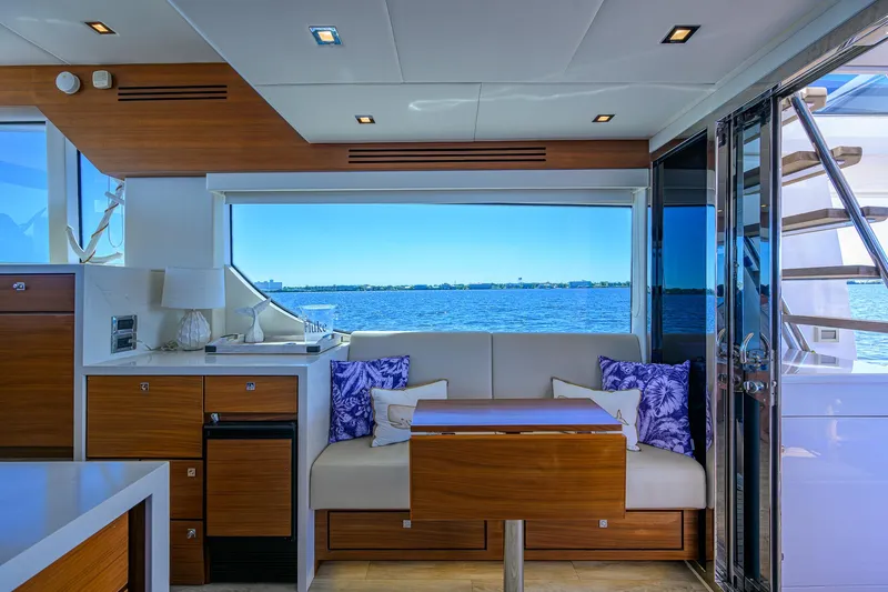 Fluke Yacht Photos Pics Interior of 2020 Kadey-Krogen 54 Summit Motoryacht with ocean view and modern seating area.