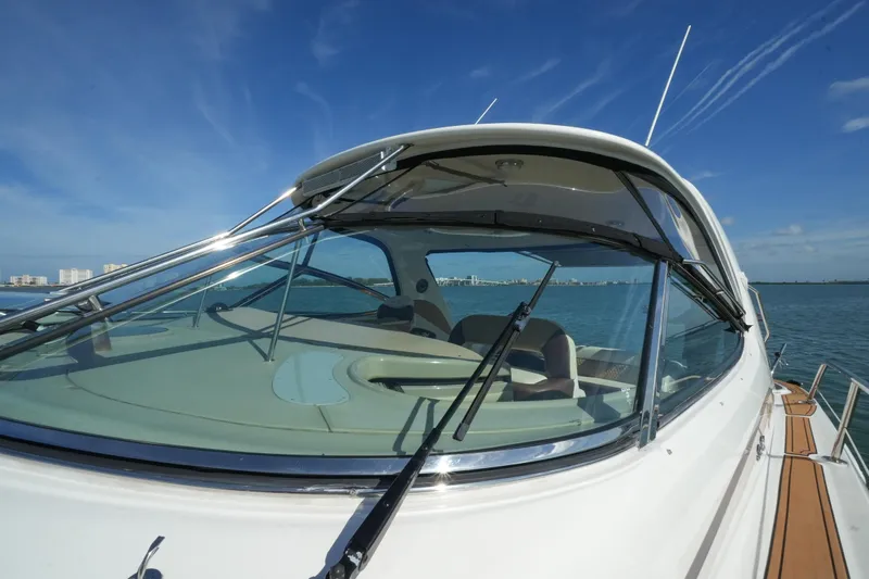  Yacht Photos Pics 2001 Sea Ray 510 Sundancer yacht on open water, clear sky background.