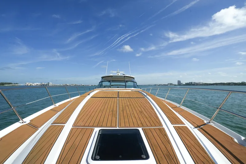  Yacht Photos Pics 2001 Sea Ray 510 Sundancer yacht on open water, clear sky, wooden deck.