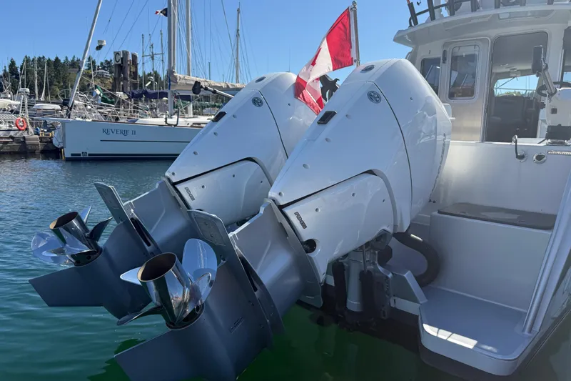 Hardy Yacht Photos Pics 2020 Coastal Craft 33 ProFish with dual outboard motors at marina.