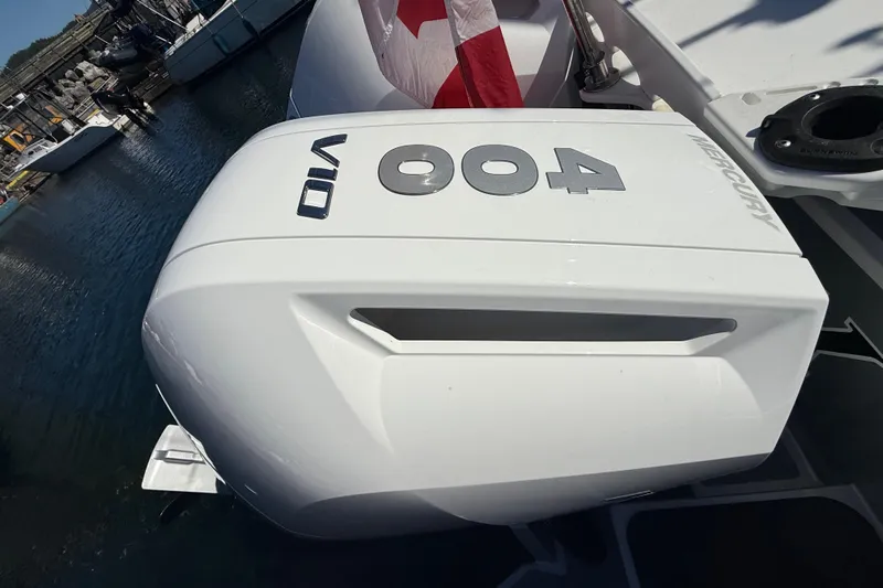 Hardy Yacht Photos Pics Outboard motor on 2020 Coastal Craft 33 ProFish, docked with Canadian flag.