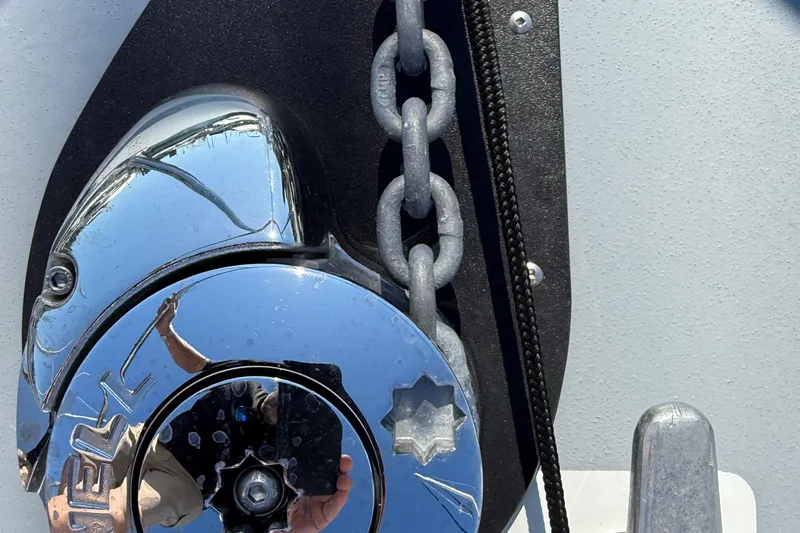 Hardy Yacht Photos Pics Close-up of a 2020 Coastal Craft 33 ProFish anchor chain and winch mechanism.
