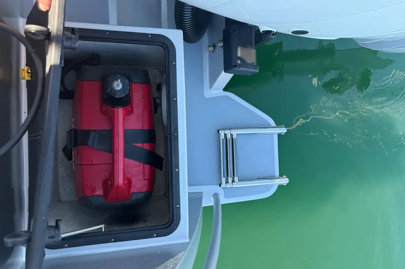 Hardy Yacht Photos Pics 2020 Coastal Craft 33 ProFish boat with red fuel tank and ladder.