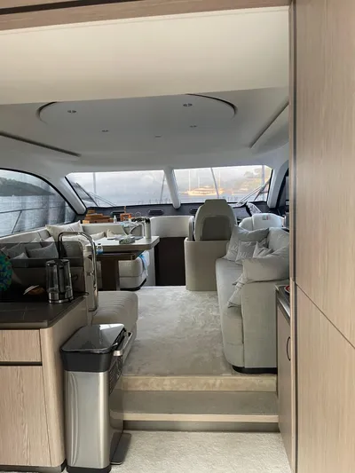  Yacht Photos Pics Luxurious interior of 2023 Azimut Fly 53 yacht with modern furnishings and panoramic windows.