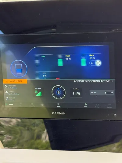  Yacht Photos Pics Garmin display on 2023 Azimut Fly 53 showing assisted docking and tank levels.